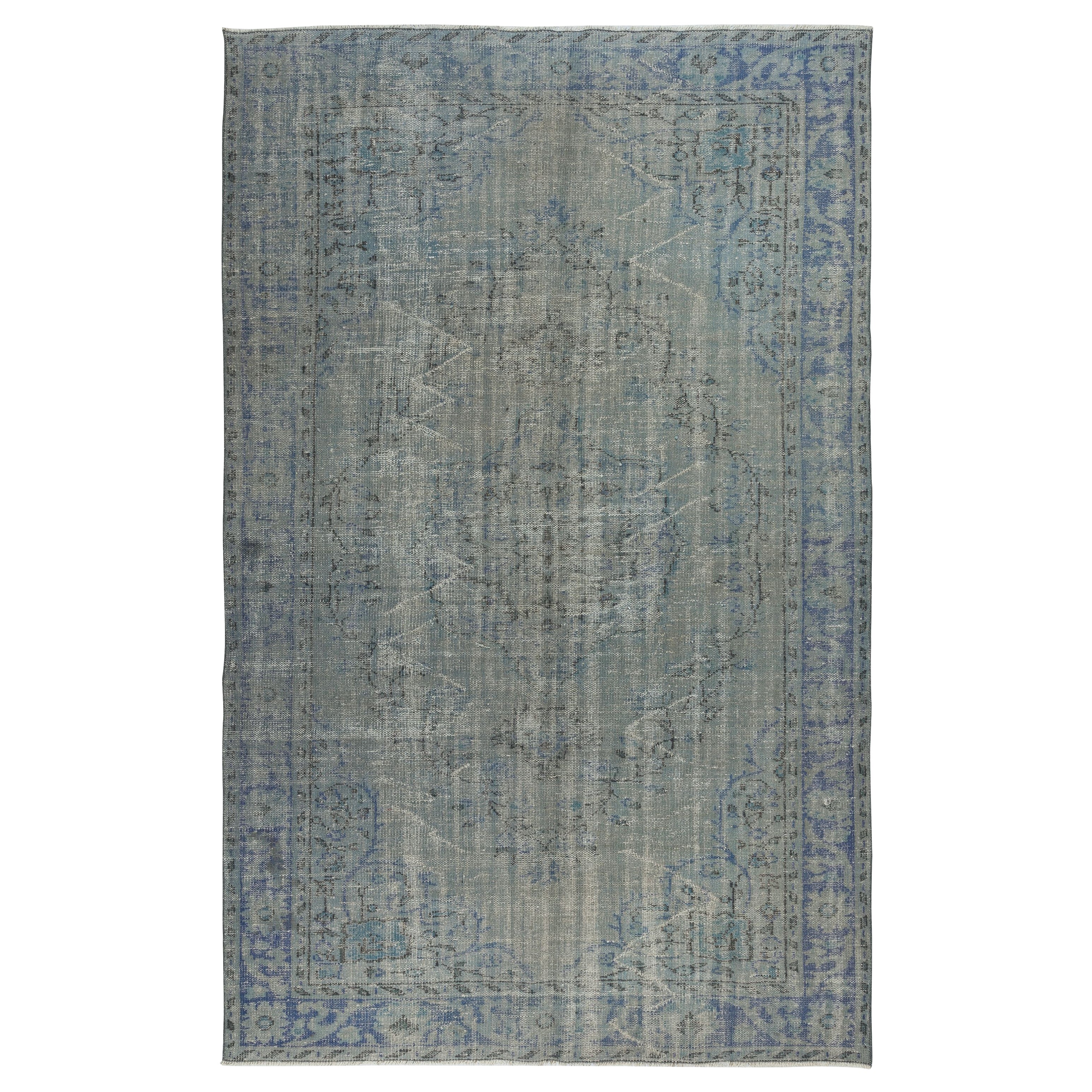 6.3x10 Ft Vintage Turkish Area Rug redyed in Blue Color for modern interiors