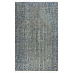 6.3x10 Ft Vintage Turkish Area Rug redyed in Blue Color for modern interiors