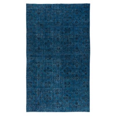 5.7x9.7 Ft Vintage Turkish Area Rug redyed in Blue Color for modern interiors