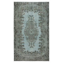 5.5x9 Ft Contemporary Blue Area Rug with Medallion Design. HandKnotted in Turkey