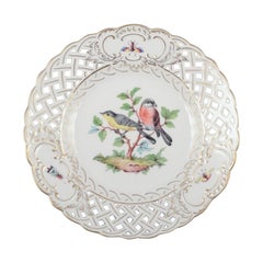 Meissen, Germany. Open lace porcelain plate with bird motif and insects