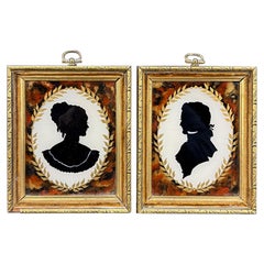 Coppia di Silhouettes & Profiles dipinte a rovescio in Francia del XIX secolo