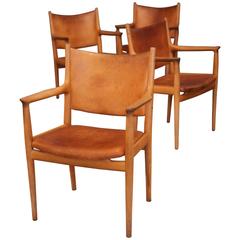 Hans Wegner JH-713 Oak and Natural Leather Armchairs, 1960s