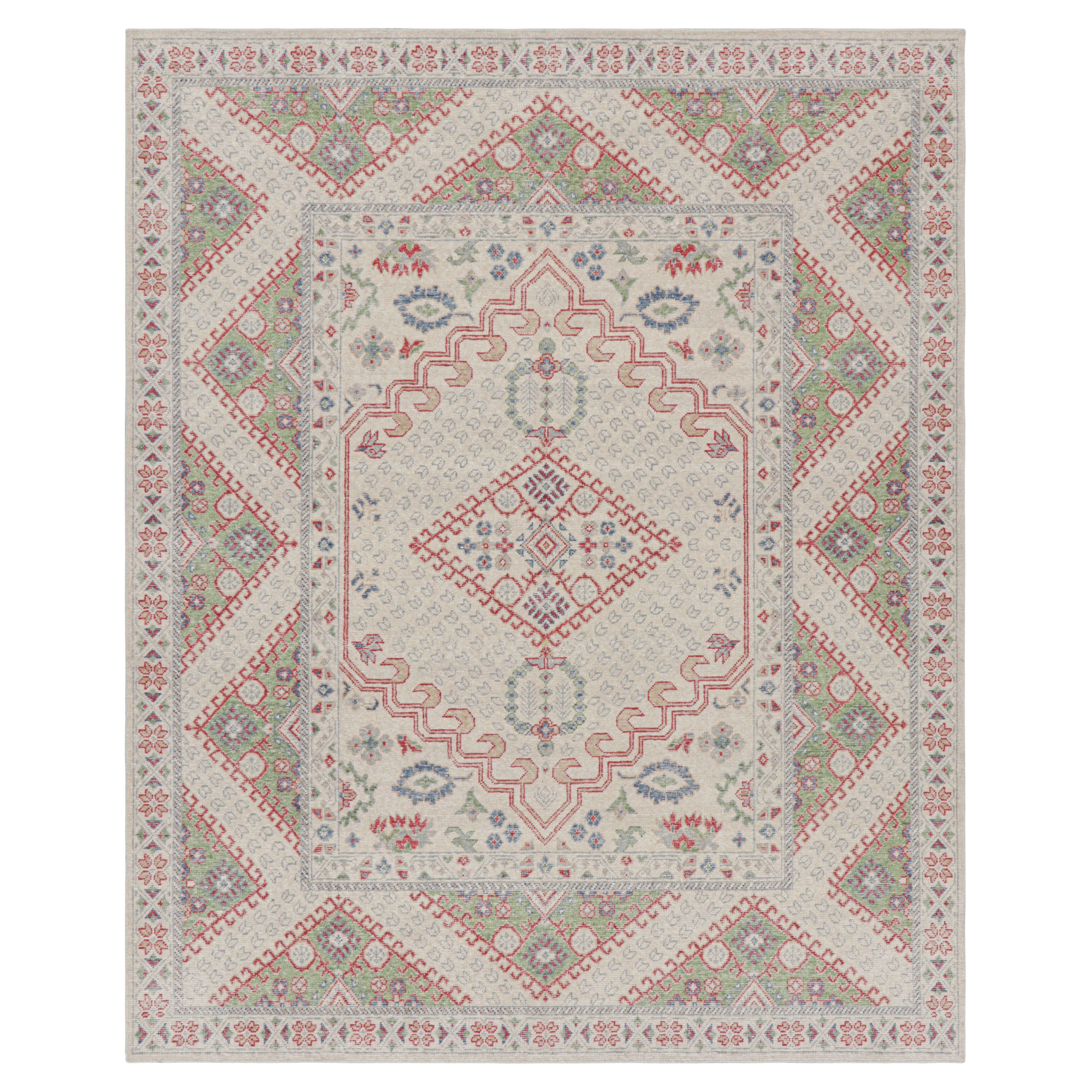 Rug & Kilim’s Distressed Ghiordes Style Rug in Cream, Green, and Red with Medall