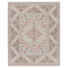 Rug & Kilim's Distressed Ghiordes Style Rug in Cream, Green, and Red with Medall