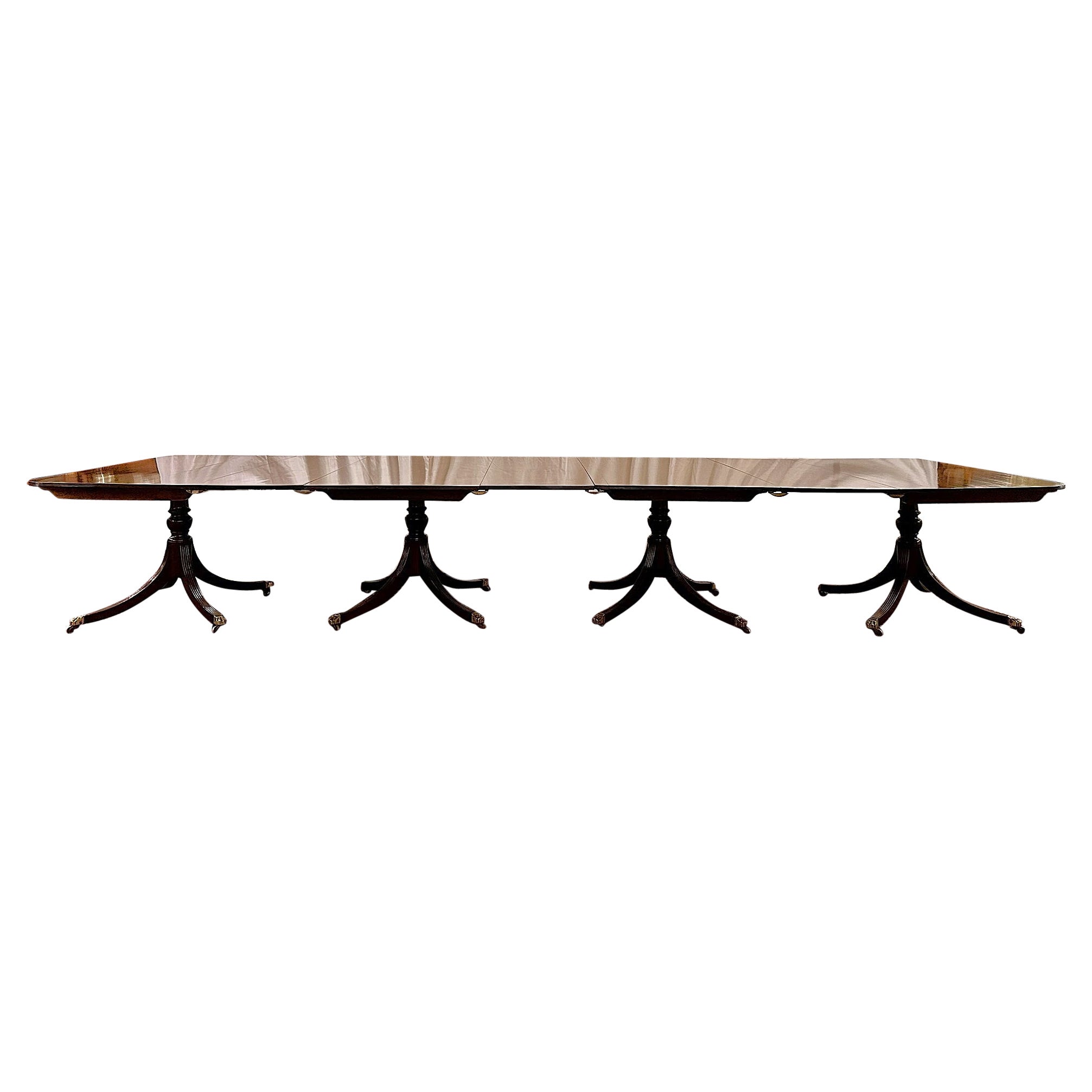 Grande table de salle à manger ancienne à quatre piédestaux en acajou, vers les années 1890