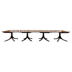 Grande table de salle à manger ancienne à quatre piédestaux en acajou, vers les années 1890