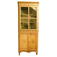 Corner display cabinet in yellow lacquered wood with glass part, Italy