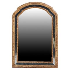 Miroir français sculpté en acajou doré, attribué à Jansen, C. 1945.