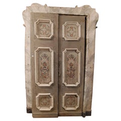 Puerta de dos hojas de madera lacada y pintada con marco original, Italia