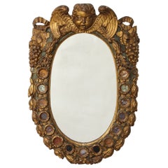 Italienischer Barockspiegel aus dem 18. Jh., geschnitzt und aus Giltwood mit Hartsteinintarsien