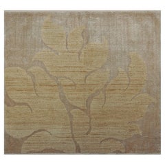 Alfombra cuadrada contemporánea Rug & Kilim en beige-marrón con motivos dorados apagados