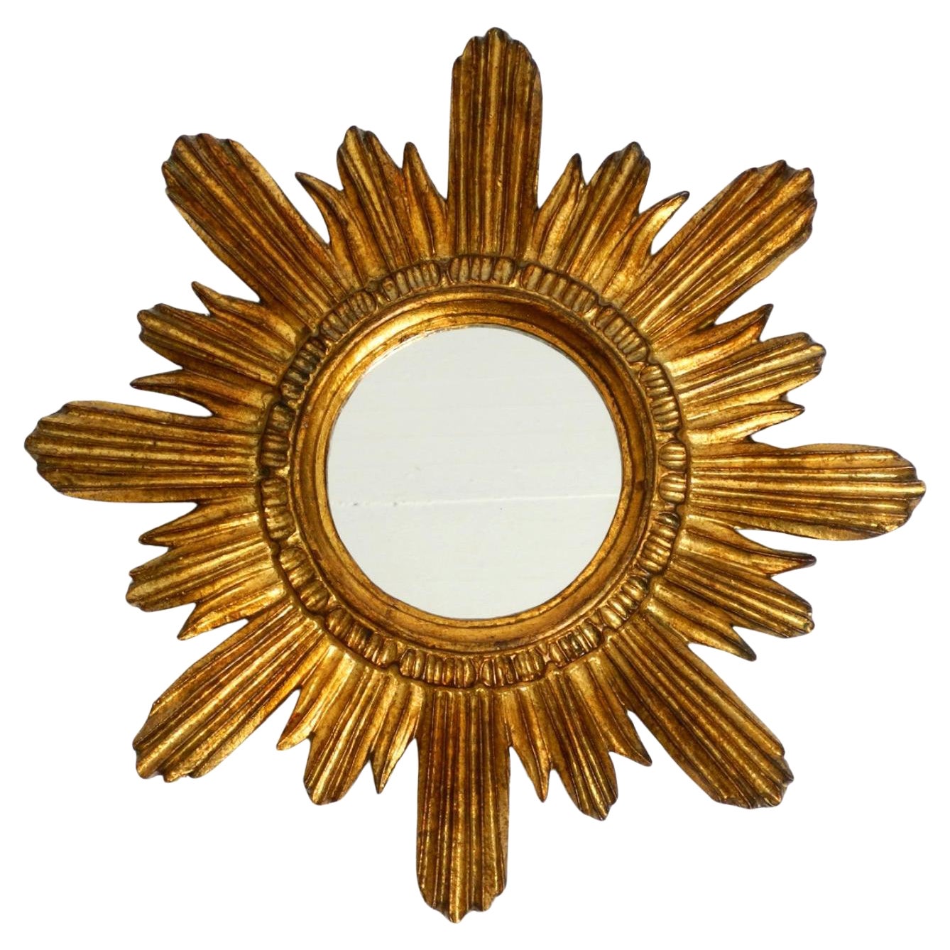 Beautiful Italian Mid Century Sunburst wall mirror made of wood gold plated