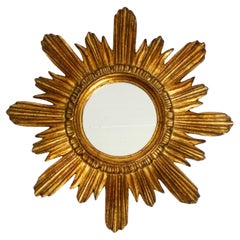 Schöner italienischer Mid-Century-Wandspiegel mit Sonnenschliff aus Holz, vergoldet