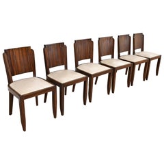 Juego de seis sillas de comedor de ébano de macassar estilo Art Déco francés Jules Leleu