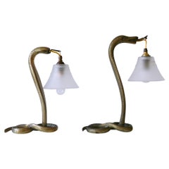 Conjunto de dos lámparas decorativas de sobremesa Art Nouveau Cobra de Bronce Francia Década de 1910
