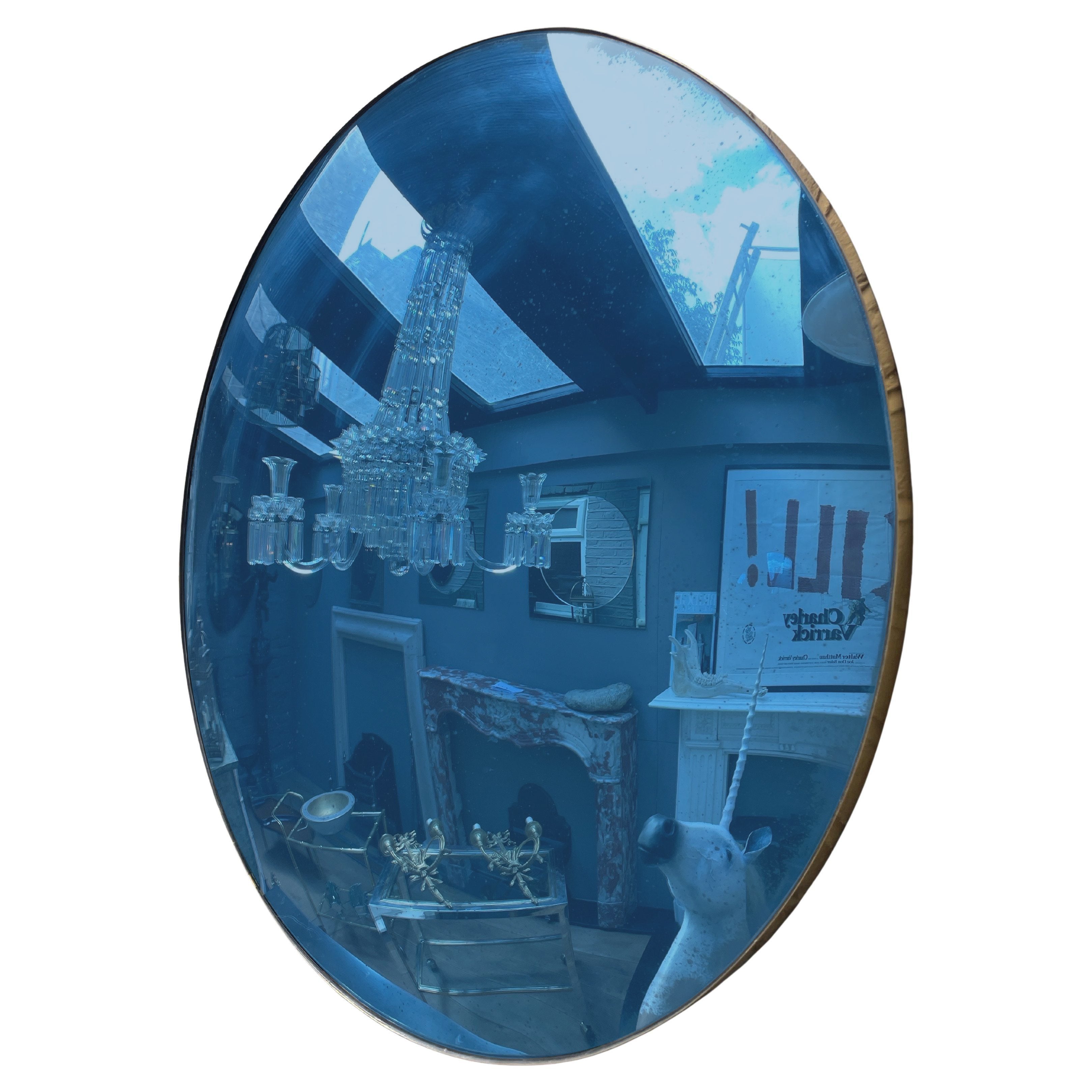 A Large Blue Convex Mirror with distressed finish