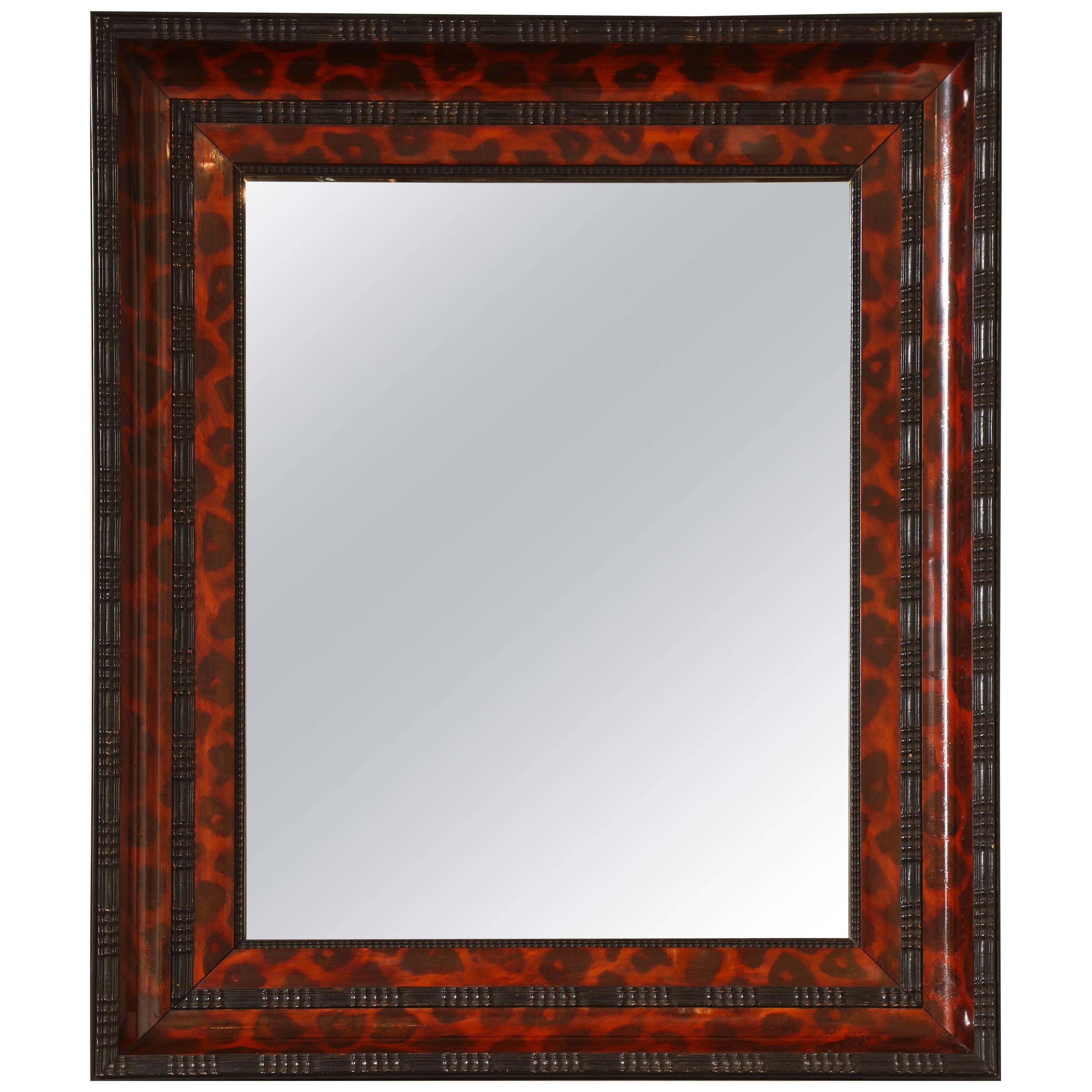 Ebonized and Lacquered Faux Tortoise Shell Decorated Mirror Frame