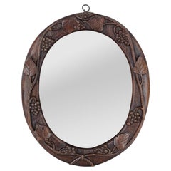 Petit miroir antique ovale en bois sculpté à la main, vers 1880