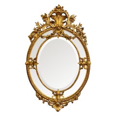 19th Century French Louis XVI Carved and Giltwood Oval Mirror