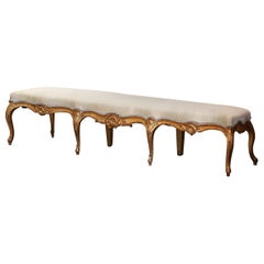 19th Century French Louis XV Carved Giltwood Upholstered Eight-Leg Bench