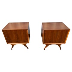 A pair of Fully Refinished Mid Century Modern Sculpted Nightstands. Circa 1960s