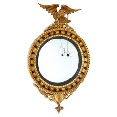 Antique 19th Century carved gilt convex mirror