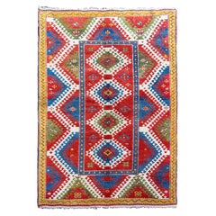 5.5x7 Ft Reproduction of an antique Caucasian Bordjalou Kazak Rug. 100% wool