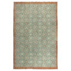 7.3x11 Ft Vintage Hand-Made Green Area Rug with Floral Design & Solid Red Border (Tapis de zone vert vintage avec motifs floraux et bordure rouge unie)