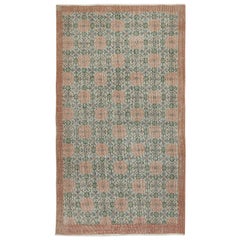 Tappeto vintage fatto a mano di colore verde con design floreale e bordo rosso solido 3.8x6.8 Ft