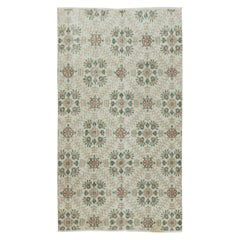 3.8x6.7 Ft One of a pair Vintage Handmade Turkish Accent Rug with Floral Design