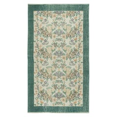 Tappeto turco vintage fatto a mano di 3,8x6,6 piedi con design floreale e bordo verde solido