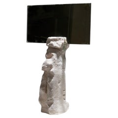 Sculpture mirror in stone