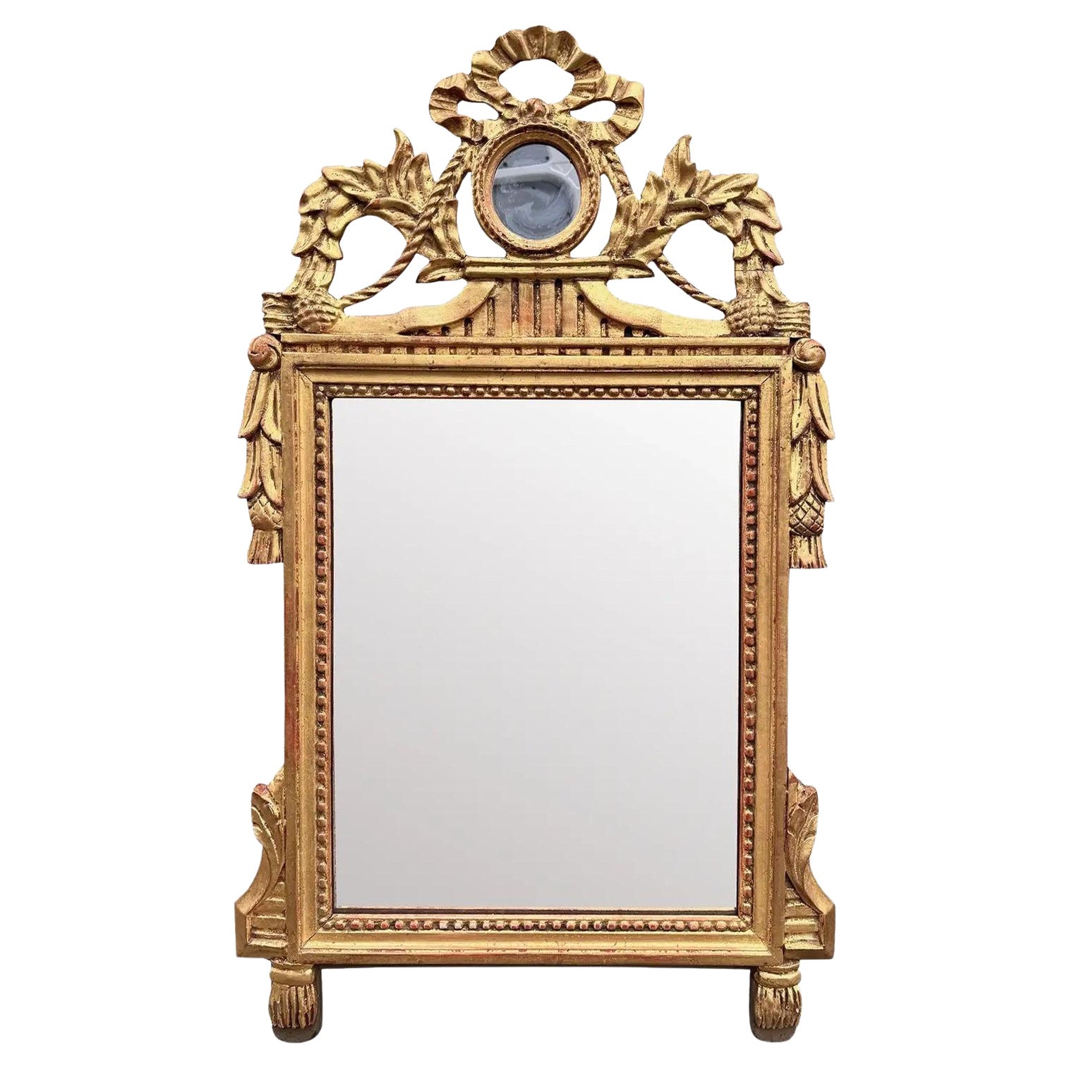 Miroir français de style Louis XVI en bois doré