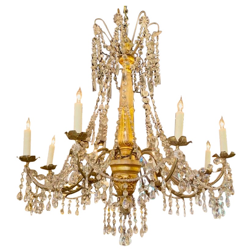 Lustre du 19ème siècle en bois doré perlé et cristal de Gênes