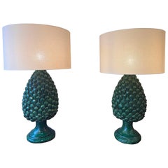 A large pair of glazed ceramic pine cones table lamps