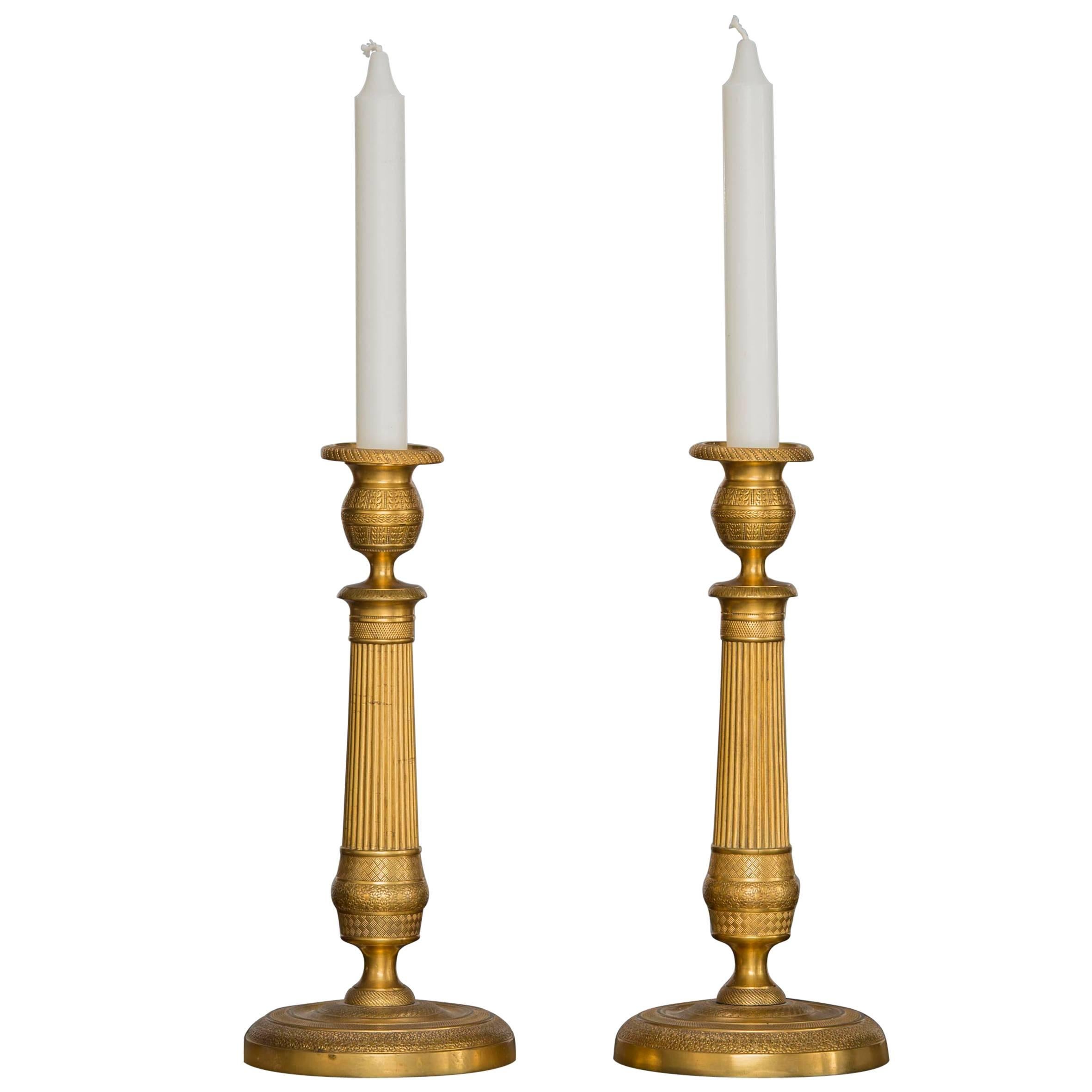Pair of French Gilded Bronze Empire Candlesticks