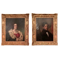 Coppia di antichi dipinti americani di ritratti su tela con cornice, CIRCA 1840.
