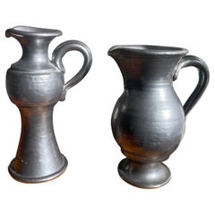 1960s set of two Jean Marais black enameled vase and jug ceramics