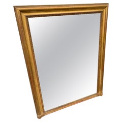 Neat sized 19th century antique gilded over mantle mirror