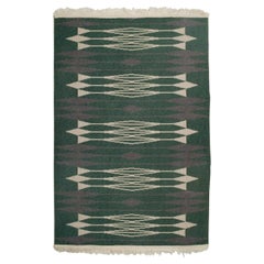 Diseñadora textil sueca. Alfombra tejida a mano en pura lana. Diseño modernista.