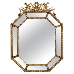 Antique Large French octagonal gilded wooden mirror in Louis XVI style
