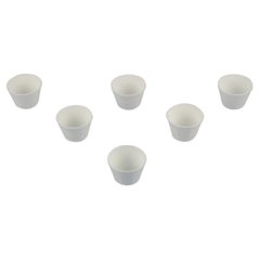 Wilhelm Kåge para Gustavsberg. Seis macetas de porcelana blanca. Diseño sueco.