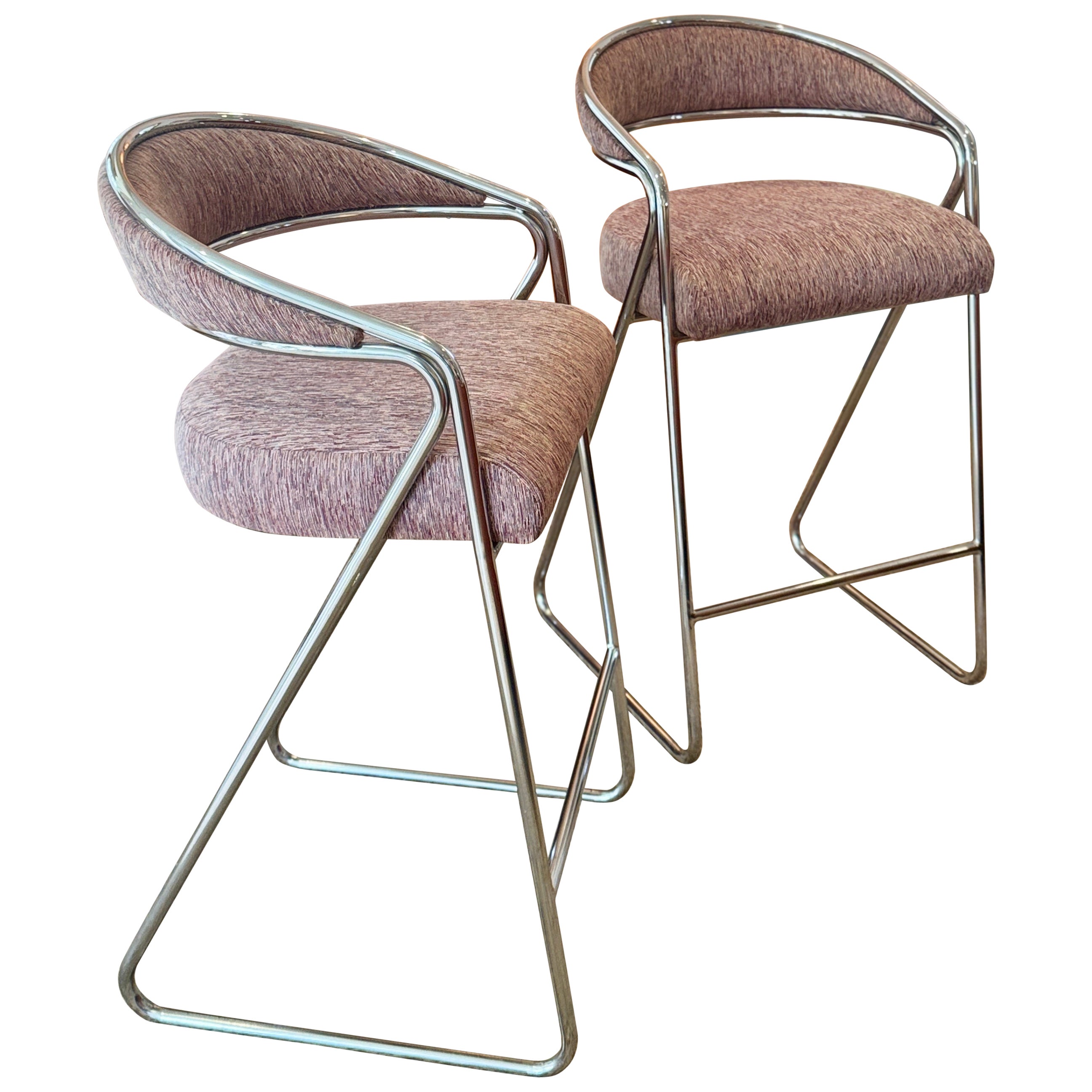 A pair of chrome bar stools attributed to Milo Baughman, circa 1970s.