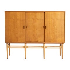 Illum Wikkelsø Buffet haut en teck et Oak Oak