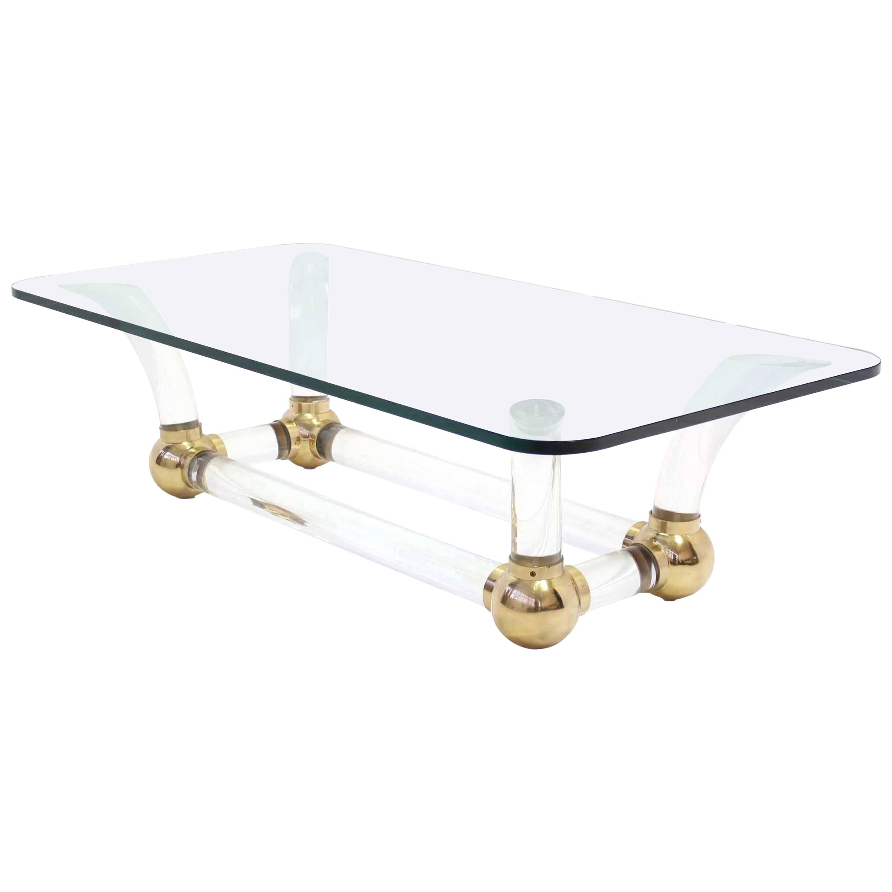 Heavy Thick Lucite and Brass Base Thick Glass Top Coffee Table For Sale