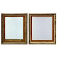 Paire de miroirs muraux à cadre doré avec garniture de Sienne et bordure florale
