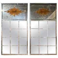 Paire de miroirs ensoleillés de type "Eglomise" de la Maison Jansen avec verre divisé