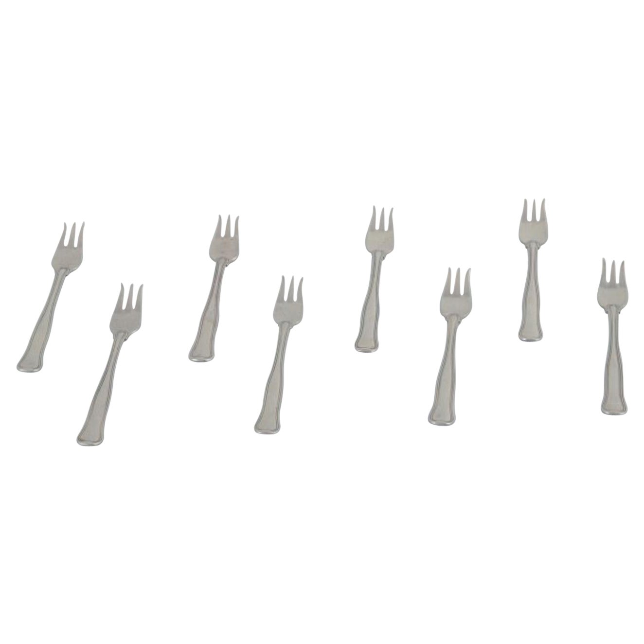 Georg Jensen. Un set di otto forchette da pasticceria "Old Danish" in argento sterling. in vendita