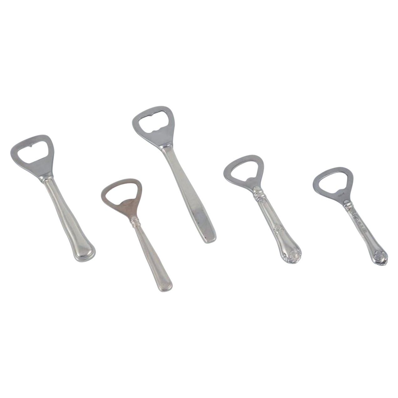 Evald Nielsen, Cohr, and other Danish silversmiths. Five bottle openers.